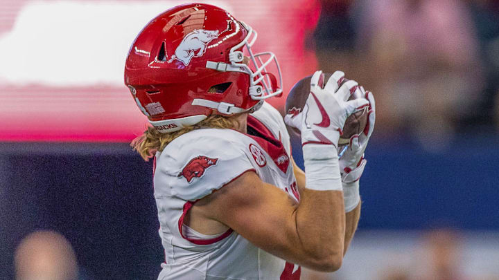 Arkansas Razorbacks wide receiver Isaac TeSlaa makes a catch on the third play of the against the Texas A&M Aggies at AT&T Stadium in Arlington, Texas Arkansas Razorbacks wide receiver Isaac TeSlaa makes a catch on the third play of the against the Texas A&M Aggies at AT&T Stadium in Arlington, Texas