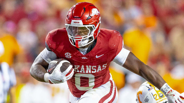Arkansas Razorbacks running back Braylen Russell runs for a big gain against the Tennessee Volunteers at Razorback Stadium in Fayetteville, Ark.