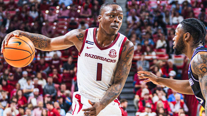 Arkansas Razorbacks guard Johnell Davis looks inside against the Lipscomb Bisons in a game at Bud Walton Arena in Fayetteville, Ark.