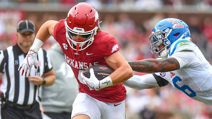 Arkansas Razorbacks tight end Isaac TeSlaa turns up field after making a catch against the Ole Miss Rebels at Razorback Stadium in Fayetteville, Ark. Arkansas Razorbacks tight end Isaac TeSlaa turns up field after making a catch against the Ole Miss Rebels at Razorback Stadium in Fayetteville, Ark.