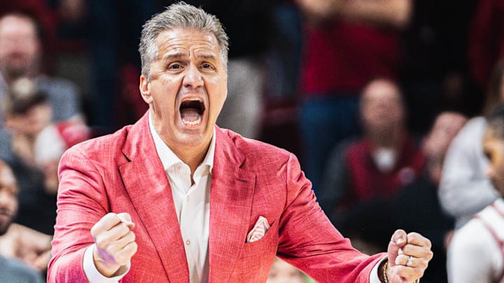 Arkansas Razorbacks coach John Calipari reacts to a made shot against the Georgia Bulldogs in a 68-65 comeback win Wednesday night at Bud Walton Arena in Fayetteville, Ark.