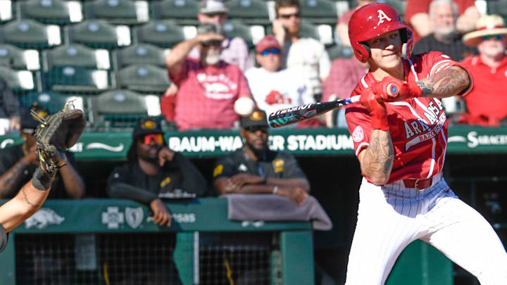 Arkansas Razorbacks designated hitter Kuhio Aloy takes a pitch against the Grambling Tigers at Baum-Walker Stadium in Fayetteville, Ark. Arkansas Razorbacks designated hitter Kuhio Aloy takes a pitch against the Grambling Tigers at Baum-Walker Stadium in Fayetteville, Ark.