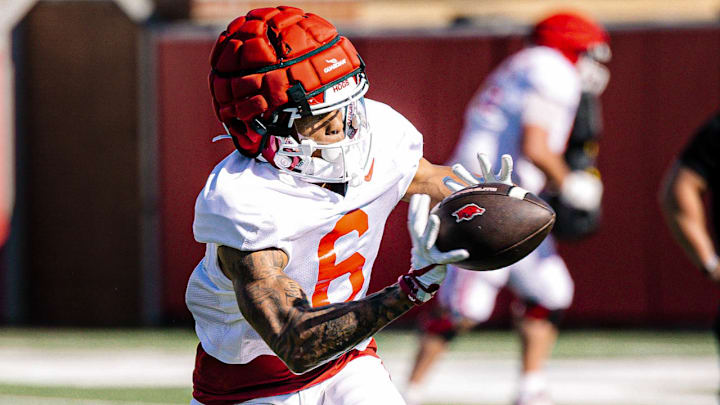 Arkansas Razorbacks wide receiver Raylen Sharpe makes a catching during a spring practice on the outdoor practice fields in Fayetteville, Ark.