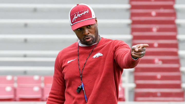 Arkansas Razorbacks defensive coordinator Travis Williams instructs his unit during spring practice inside Razorback Stadium Saturday, March 15.