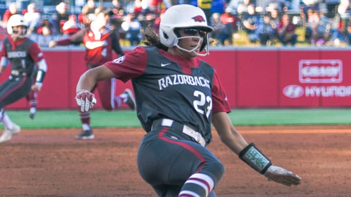 Arkansas Razorbacks' Reagan Johnson slides into home against the South Carolina Gamecocks at Bogle Park in Fayetteville, Ark. Arkansas Razorbacks' Reagan Johnson slides into home against the South Carolina Gamecocks at Bogle Park in Fayetteville, Ark.