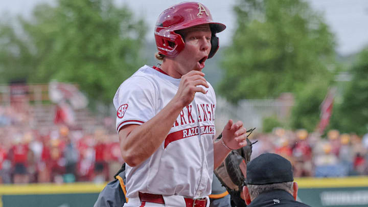 Arkansas Razorbacks Reese Robinett after being called out on a play at home plate against the Tennessee Volunteers at Baum-Walker Stadium.