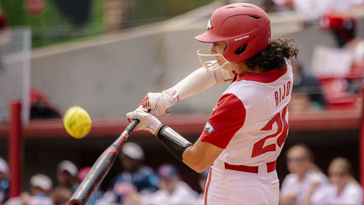 Arkansas Razorbacks shortstop Atalyia Rijo takes a swing against the Ole Miss Rebels in the NCAA Super Regional at Bogle Park in Fayetteville, Ark. Arkansas Razorbacks shortstop Atalyia Rijo takes a swing against the Ole Miss Rebels in the NCAA Super Regional at Bogle Park in Fayetteville, Ark.