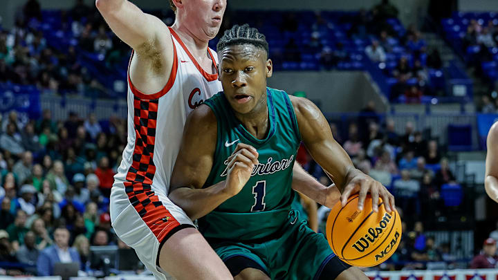 New Arkansas Razorback offer JJ Andrews from Little Rock Christian drives in the lane in the Class 4A state championship game in March at Hot Springs against the Farmington Cardinals.