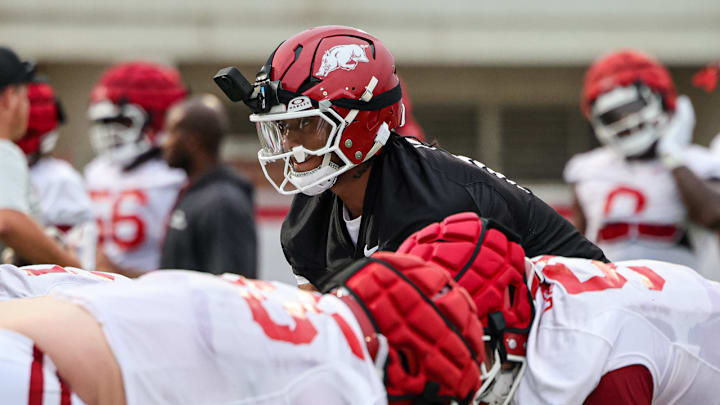 Arkansas Razorbacks quarterback Taylen Green with his VR camera at the team's first practice in Fayetteville, Ark.