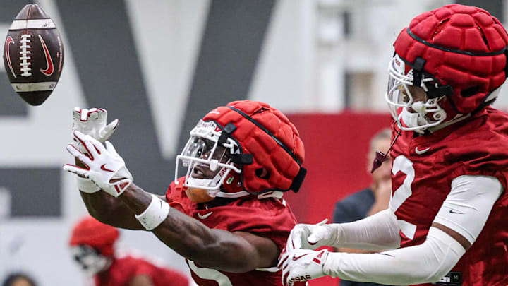 Arkansas Razorbacks' defensive back Jaheim Singletary makes a play during drills at the team's first fall practice in Fayetteville, Ark.