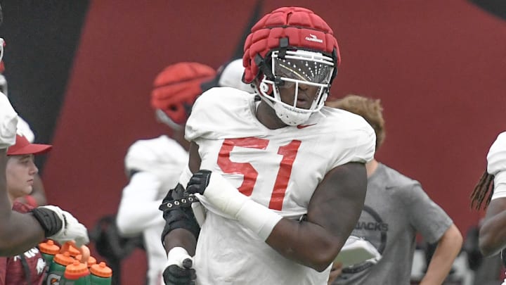 Arkansas Razorbacks offensive lineman Corey Robinson II at Thursday morning's media viewing section of practice on the indoor field.