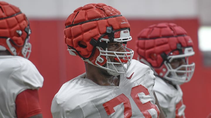 Arkansas Razorbacks offensive lineman E'Marion Harris at Thursday morning's media viewing section of practice on the indoor field.