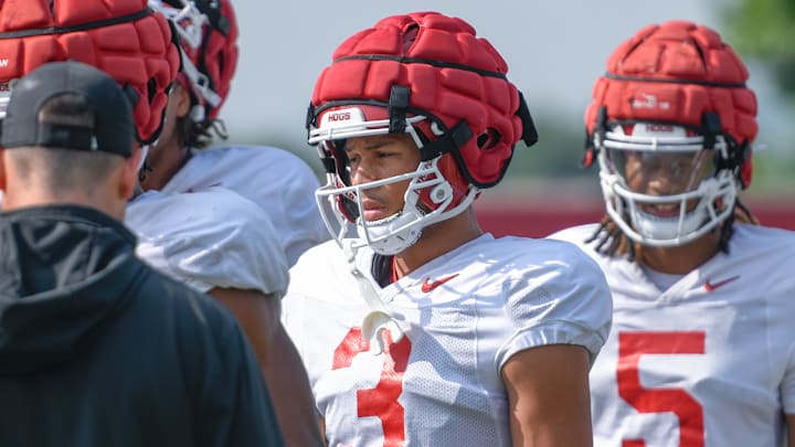 Arkansas Razorbacks wide receiver CJ Brown listens to the coaching staff during preseason practices on the outdoor fields in Fayetteville, Ark.