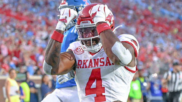 Arkansas Razorbacks running back Mike Washington celebrates after scoring against the Ole Miss Rebels at Vaught-Hemingway Stadium in Oxford, Miss.