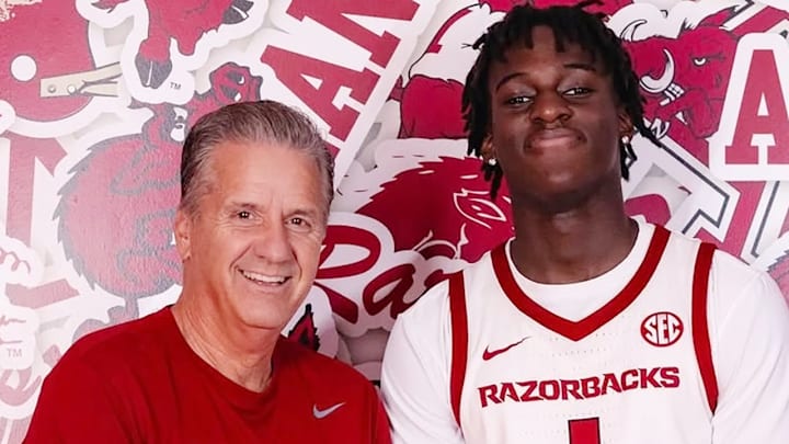 Arkansas Razorbacks coach John Calipari with Abdou Toure on a recruiting visit in Fayetteville, Ark.