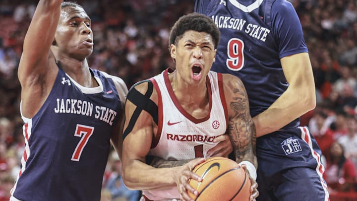 Arkansas Razirbacks forward Meleek Thomas down load against the Jackson State Tigers at Bud Walton Arena in Fayetteville, Ark.