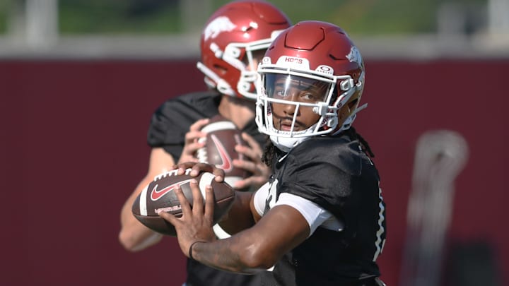Arkansas Razorbacks quarterback Trever Jackson throws a pass during preseason practices outdoors on the practice fields in Fayetteville, Ark.