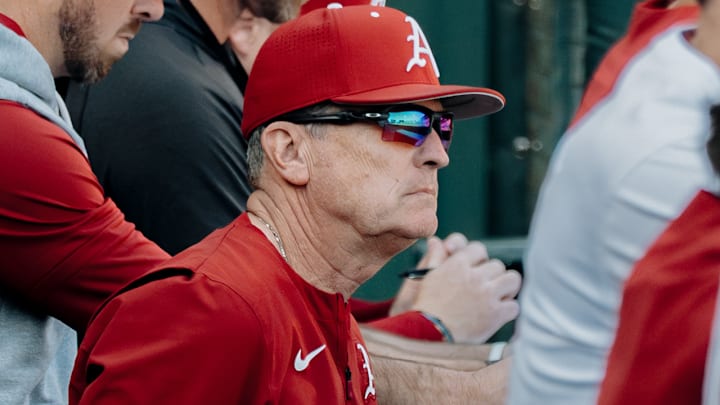 Arkansas Razorbacks coach Dave Van Horn in dugout during game against UT Arlington at Baum-Walker Stadium in Fayetteville, Ark.
