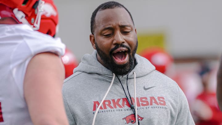 Arkansas Razorbacks defensive line coach Kynjee' Cotton during spring practice drills. Arkansas Razorbacks defensive line coach Kynjee' Cotton during spring practice drills.