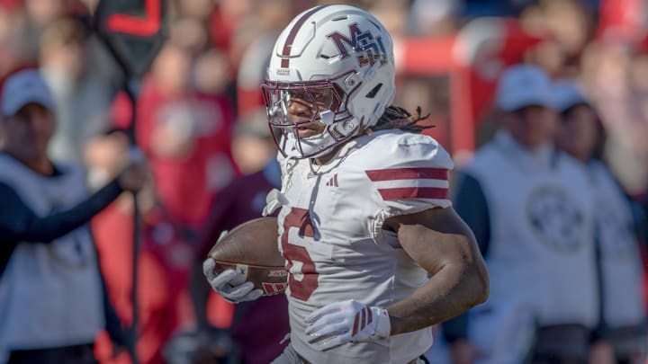 Mississippi State Bulldogs running back Davon Booth against the Arkansas Razorbacks at Razorback Stadium in Fayetteville, Ark. Mississippi State Bulldogs running back Davon Booth against the Arkansas Razorbacks at Razorback Stadium in Fayetteville, Ark.