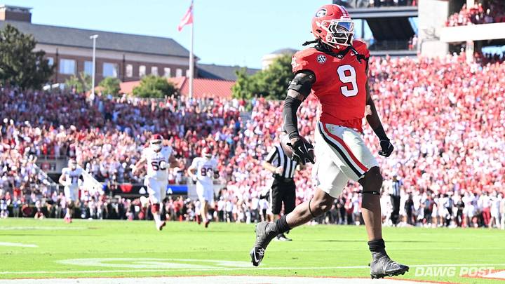 Georgia Bulldogs linebacker Chris Cole returns a fumble for a touchdown against the Oklahoma Sooners in Sanford Stadium in Athens, Georgia | 9/26/2026 Georgia Bulldogs linebacker Chris Cole returns a fumble for a touchdown against the Oklahoma Sooners in Sanford Stadium in Athens, Georgia | 9/26/2026