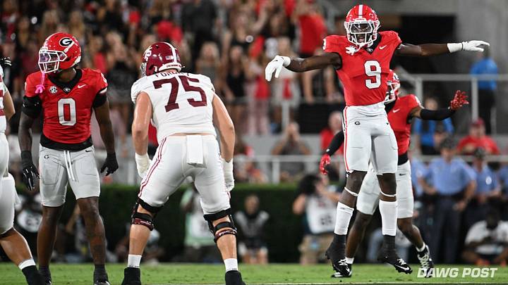 Sanford Stadium; Athens, Georgia; 09/27/2025; Georgia linebacker Chris Cole jumps up before Alabama quarterback Ty Simpson snaps the football. 