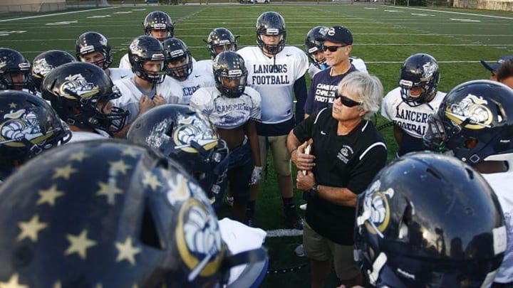 Bob Dare is stepping down as football coach at Bishop McLaughlin to join his son's staff, as defensive coordinator, at Keswick Christian.