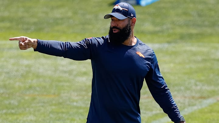 Denver Broncos outside linebackers coach Michael Wilhoite during training camp at Centura Health Training Center. 