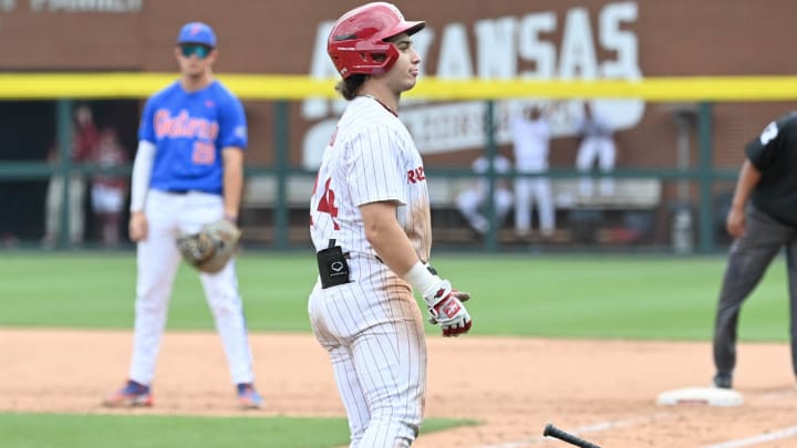 Arkansas Razorbacks' Peyton Holt reacts to the crowd after a seventh-inning homer in big inning in 6-5 win Saturday to close out series-clinching win.