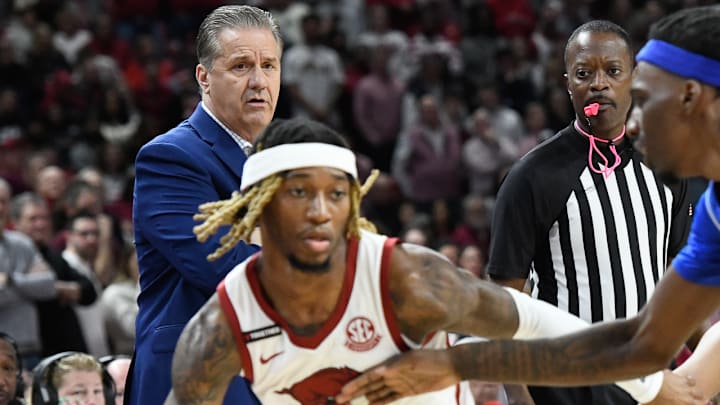 Kentucky Wildcats coach John Calipari watches El Ellis of the Arkansas Razorbacks driving in a game on Jan. 27, 2024, at Bud Walton Arena in Fayetteville, Ark. Kentucky Wildcats coach John Calipari watches El Ellis of the Arkansas Razorbacks driving in a game on Jan. 27, 2024, at Bud Walton Arena in Fayetteville, Ark.