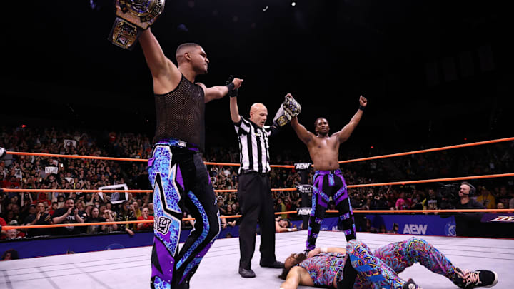 Private Party after capturing the AEW World Tag Team Championships