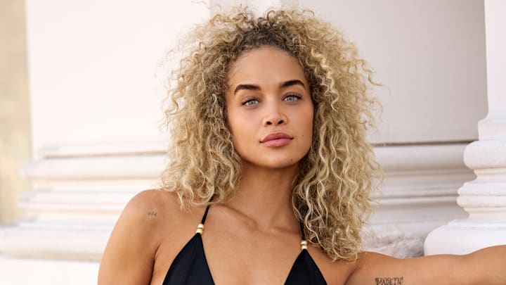 Jasmine Sanders was photographed by Derek Kettela in Zurich, Switzerland. Swimsuit by Hanne Bloch. Jacket by Retrofete. Jasmine Sanders was photographed by Derek Kettela in Zurich, Switzerland. Swimsuit by Hanne Bloch. Jacket by Retrofete.