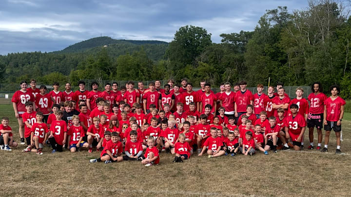 Stevens High School players join youth players at Cardinal Day.