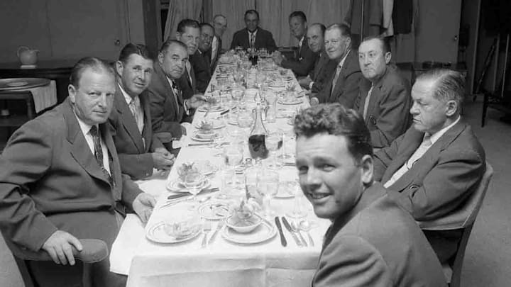 The 1957 Champions dinner (clockwise from bottom left): Craig Wood, Henry Pickard, Gene Sarazen, Horton Smith, Claude Harmon, Augusta National chairman Cliff Roberts, Ben Hogan, Jimmy Demaret, Sam Snead, Byron Nelson, Herman Keiser, Bobby Jones, and Jack Burke, Jr. 