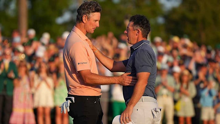 Rose and McIlroy after the playoff was decided.