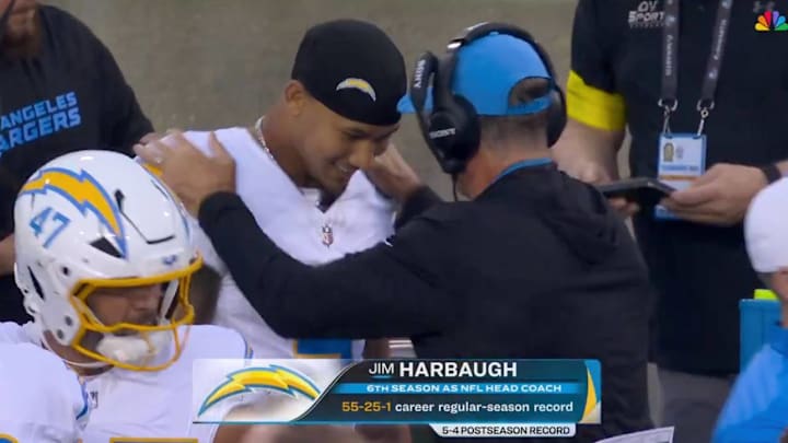 Los Angeles Chargers coach Jim Harbaugh hypes up quarterback Trey Lance during the annual Hall of Fame game in the NFL preseason.