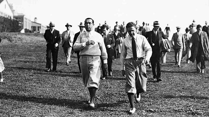 Walter Hagen (left) and Joe Kirkwood lead their gallery to the tee during the 1929 PGA Championship at Hillcrest CC in Los Angeles. Hagen won five PGA’s but Leo Diegel would win in ‘29 for his second straight title.