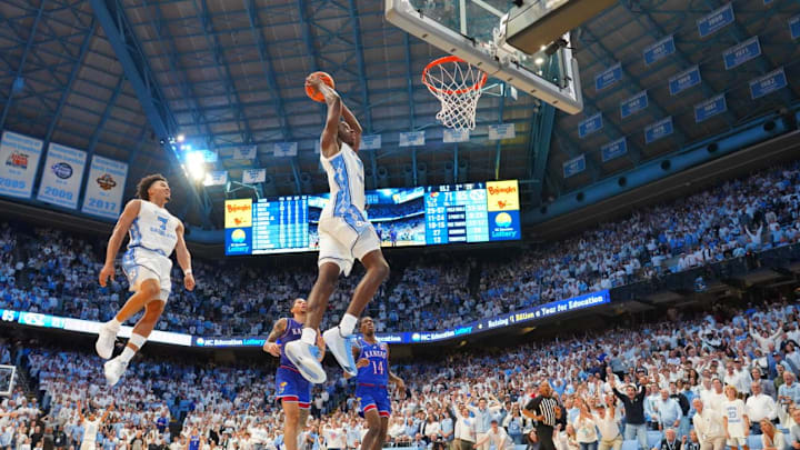 Nov 7, 2025; Chapel Hill, North Carolina, USA; North Carolina Tar Heels forward Caleb Wilson (8) dunks the ball as guard Seth Trimble (7) is in the background near the end of the second half at Dean E. Smith Center. Nov 7, 2025; Chapel Hill, North Carolina, USA; North Carolina Tar Heels forward Caleb Wilson (8) dunks the ball as guard Seth Trimble (7) is in the background near the end of the second half at Dean E. Smith Center.