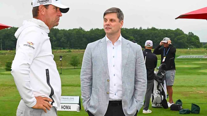 Brian Rolapp, seen here with Lucas Glover, has been settling into his new job this week. Brian Rolapp, seen here with Lucas Glover, has been settling into his new job this week.