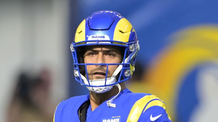 Jan 5, 2025; Inglewood, California, USA; Los Angeles Rams quarterback Jimmy Garoppolo (11) sets to pass in the first half against the Seattle Seahawks at SoFi Stadium. Mandatory Credit: Jayne Kamin-Oncea-Imagn Images