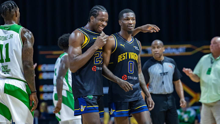 Best Virginia guards Toby Okani (25) and Kedrian Johnson (0) Best Virginia guards Toby Okani (25) and Kedrian Johnson (0)