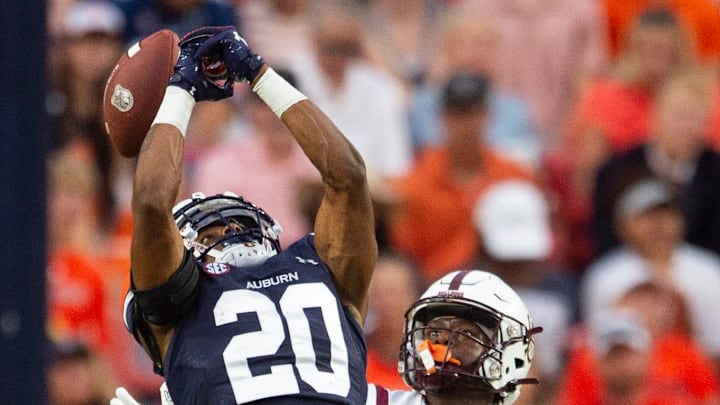 Auburn Tigers defensive back JC Hart (20) has committed to the Utah Utes for the 2025 season. Auburn Tigers defensive back JC Hart (20) has committed to the Utah Utes for the 2025 season.