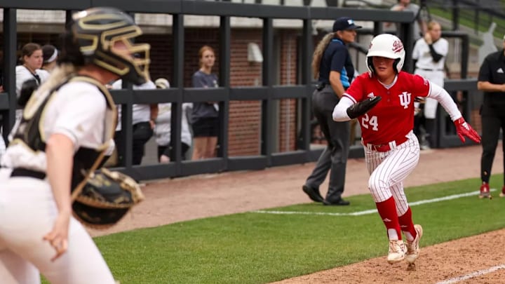 Indiana's Kinsey Mitchell heads to the plate to try to score in a recent game against Purdue. Indiana plays in the Fayetteville Regional and plays Oklahoma State in their first game on May 16. Indiana's Kinsey Mitchell heads to the plate to try to score in a recent game against Purdue. Indiana plays in the Fayetteville Regional and plays Oklahoma State in their first game on May 16.