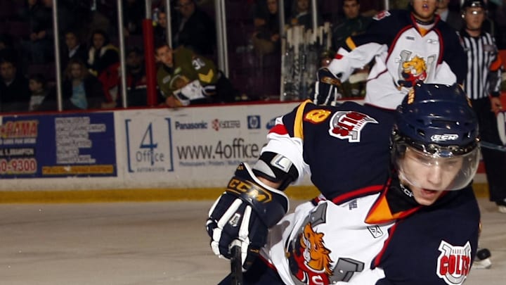 Feb 21, 2010; Brampton, ON, CANADA; Barrie Colts forward Alexander Burmistov (8) carries the puck against the Brampton Battlaion in OHL action. Mandatory Credit: John E. Sokolowski-Imagn Images