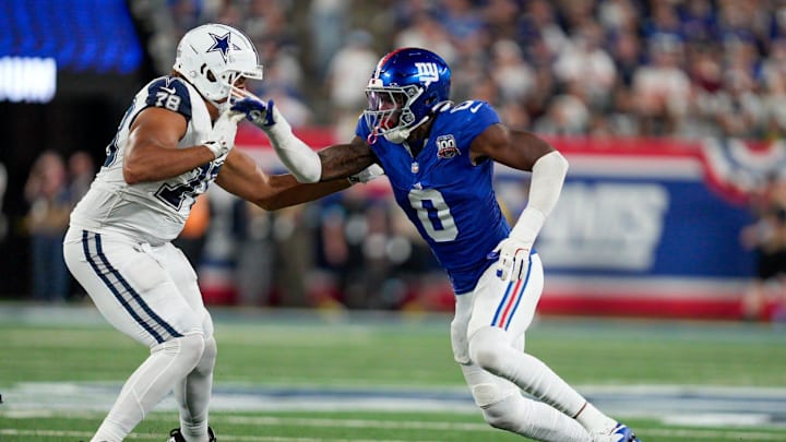 Sep 26, 2024; East Rutherford, NJ, US; New York Giants linebacker Brian Burns (0) rushes Dallas Cowboys offensive tackle Terence Steele (78) off the line of scrimmage at MetLife Stadium.  