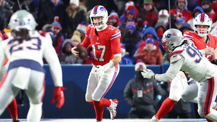 Josh Allen scrambles for a first down against the New England Patriots