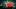 Beyond the miniature man walking on a checkout conveyor belt, look closely at the chip bags. That garbled, gibberish text is Beyond the miniature man walking on a checkout conveyor belt, look closely at the chip bags. That garbled, gibberish text is