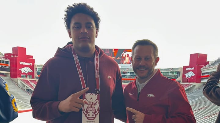 Arkansas 2027 offensive line commit Odaefe Oruru poses with Razorback coach Ryan Silverfield at Junior Day January 31, 2026. Arkansas 2027 offensive line commit Odaefe Oruru poses with Razorback coach Ryan Silverfield at Junior Day January 31, 2026.