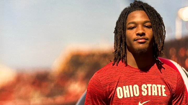 McKinney High School linebacker Riley Pettijohn (right) poses on an Ohio State football gameday visit.