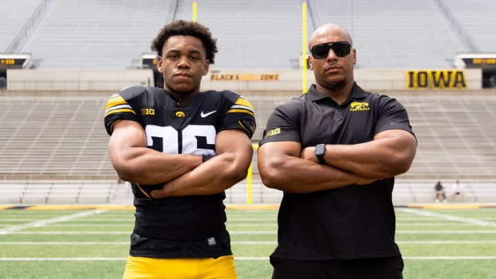 Iowa RB Xavier Williams and RB coach Ladell Betts. (Photo: hawkeyesports.com) 